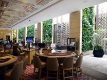 several vertical gardens, mirror each other in the Mahogany Room